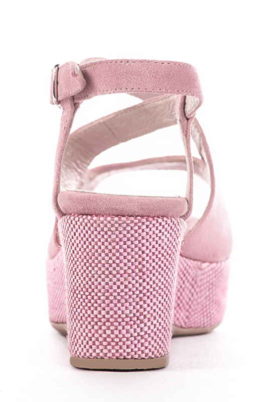 Carnation pink women's open back sandals, with crossed straps. Round toe. Medium wedge soles. Worn view - Florence KOOIJMAN